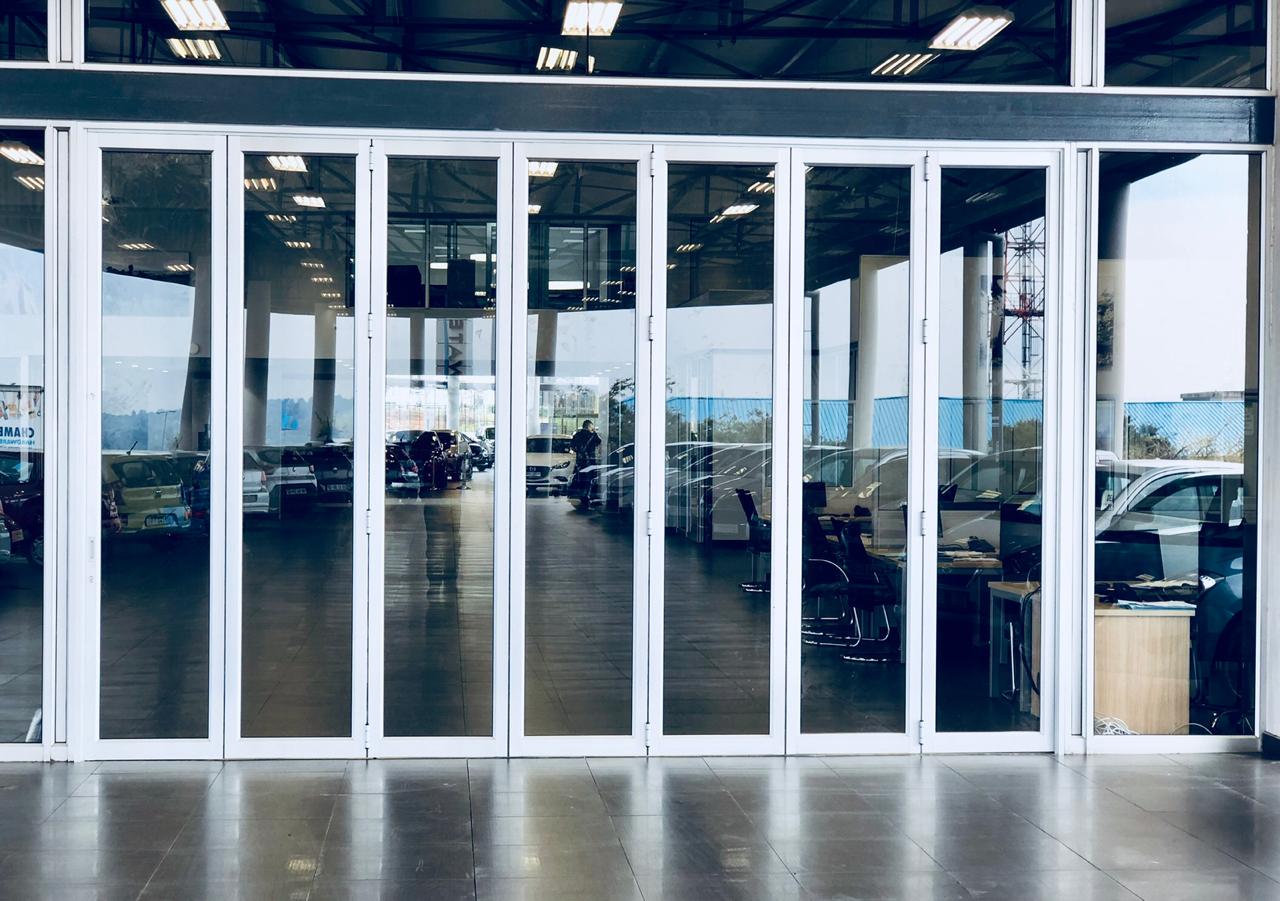 Large-scale commercial aluminium folding door facade