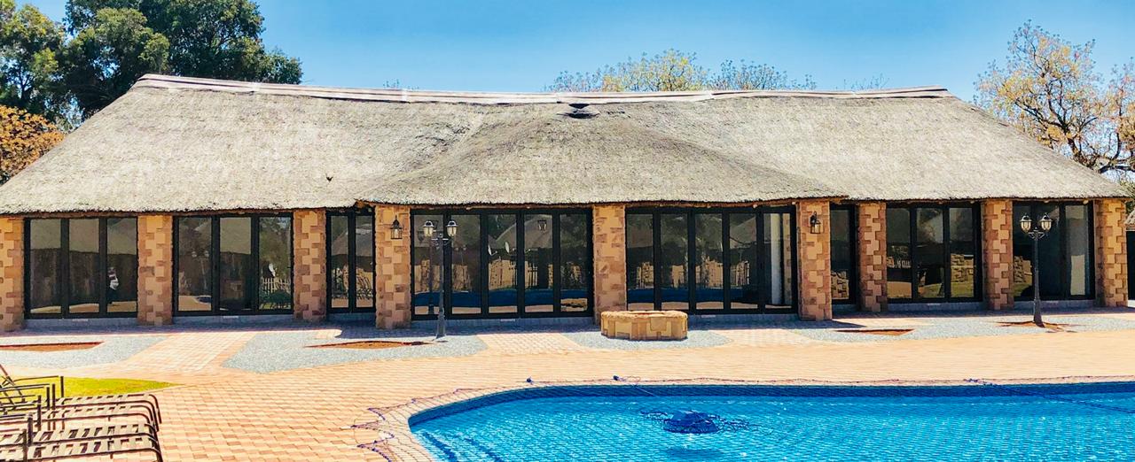 Leisure lodge — aluminium folding doors and glazing