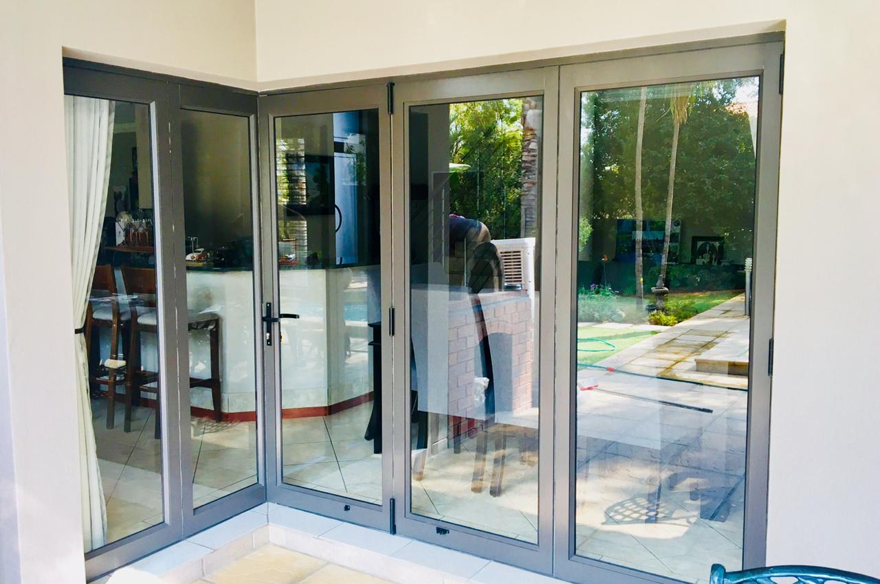 Aluminium folding patio doors — residential installation by VG Aluminium
