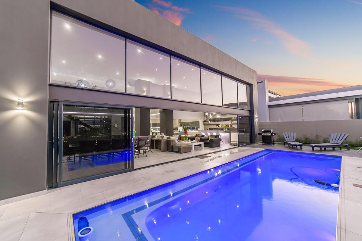 Luxury residential project — full-height aluminium glazing and folding doors by VG Aluminium