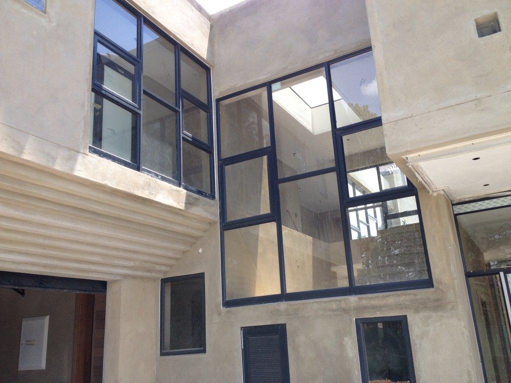 Custom aluminium casement window arrangement — bespoke fabrication by VG Aluminium